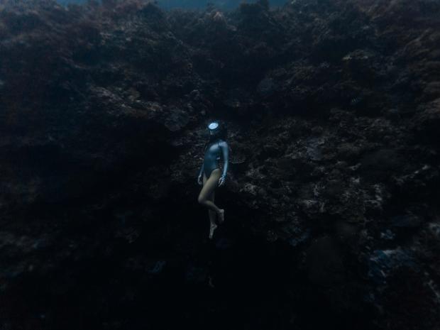 Cha Ocampo as she surfaces from her free dive