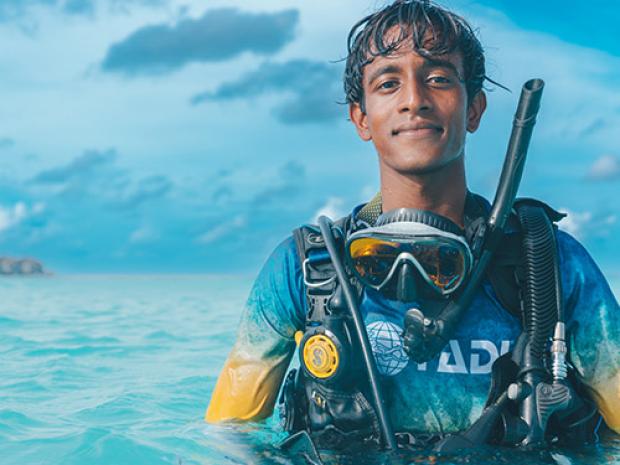 A diver wearing PADI Gear.