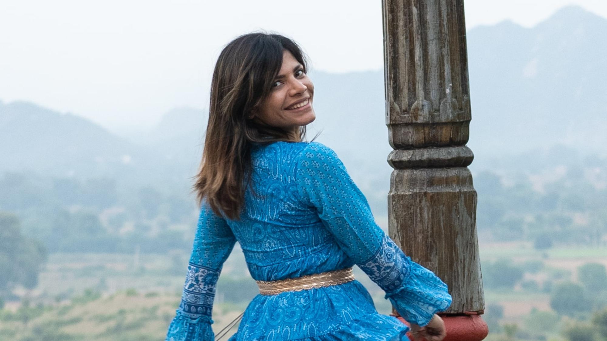 PADI AmbassaDiver Radhika Sharma posing for an outdoor photo.